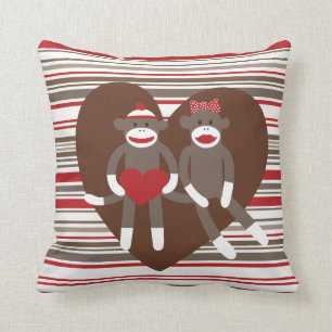 Socken-Affen in den Herz-Geschenken Kissen