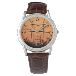 Soft orangefarbener Sonnenuntergang über Hochspann Armbanduhr