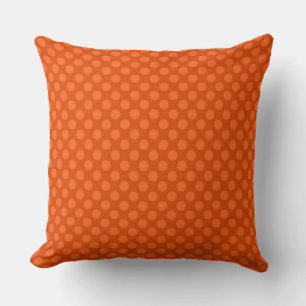 Solid orangefarbene Polka-Punkte auf orangefarbene Kissen