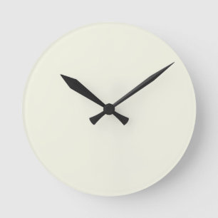 Solide, blassgelbe Wanduhr in Buttermilchgelb