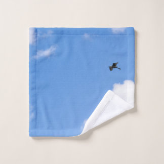 Solitary Bird Soaring Through Bright Blue Sky with