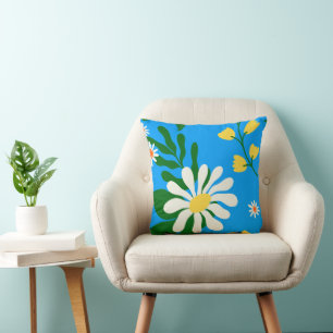 Sommerliche Blume auf blau Kissen