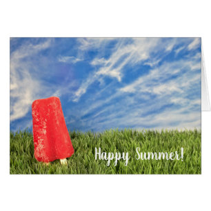 Sommersohle roter Popsikel im Gras