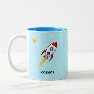 Sonne, Planet Erde und Skyrocket auf hellblau Zweifarbige Tasse