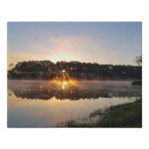 Sonnenaufgang über dem See