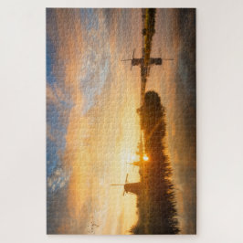 Sonnenaufgang über Windmühlen und einem Fluss in H