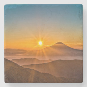 Sonnenaufgang zwischen den Hügeln Steinuntersetzer