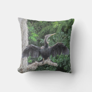 Sonnenbeschienener Anhinga auf einem moosigen Ast Kissen