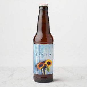 Sonnenblume an der blauen Holzwand Bierflaschenetikett