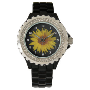Sonnenblume auf der schwarzen Uhr