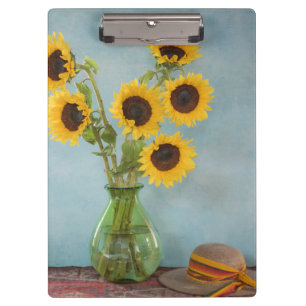Sonnenblumen in einer Vase auf einem Tisch Klemmbrett
