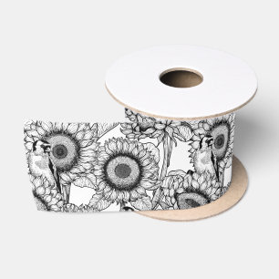 Sonnenblumen und Goldschmuck in Schwarz-Weiß Satinband