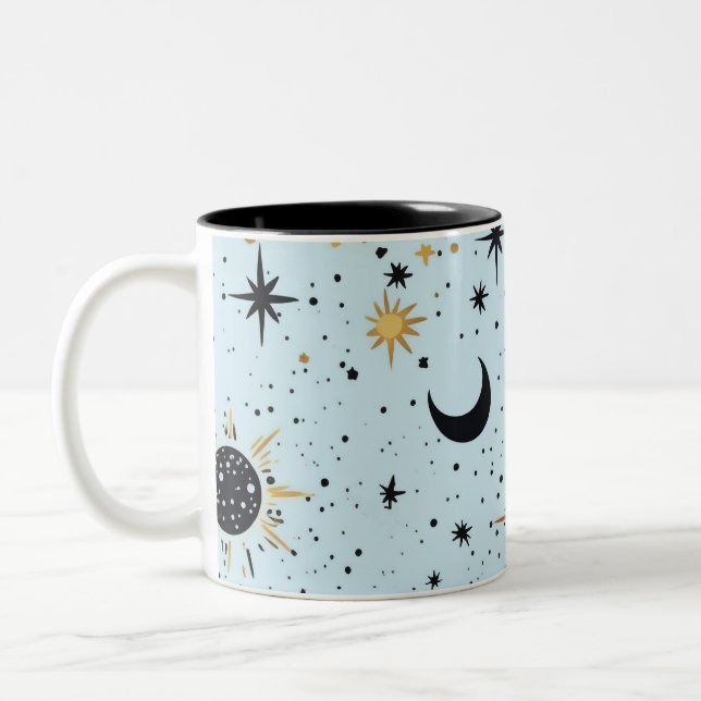 Sonnenmondstars aus Schwarz, Gold und Blau Zweifarbige Tasse (Links)