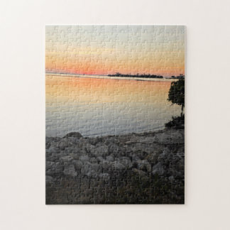 Sonnenuntergang am felsigen Strand - Puzzle