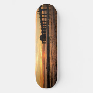 Sonnenuntergang am Pier Skateboard