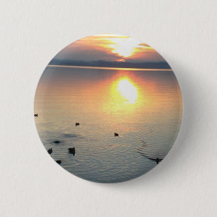 Sonnenuntergang am See mit Enten Button