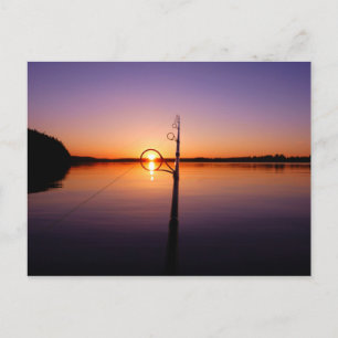 Sonnenuntergang auf einem See, der durch eine Ange Postkarte