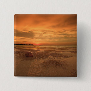 Sonnenuntergang auf einem thailändischen Strand Button
