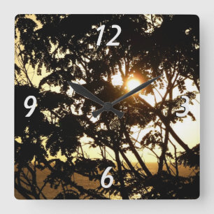 Sonnenuntergang durch Bäume I Tropische Fotografie Quadratische Wanduhr