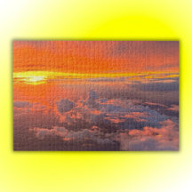Sonnenuntergang durch die Wolkendecke Orange & Gel