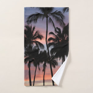 Sonnenuntergang durch tropische Palmen Badhandtuch Set