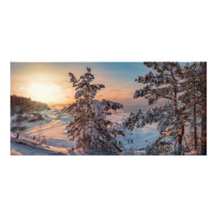 Sonnenuntergang über der schneebedeckten Küste Fotodruck