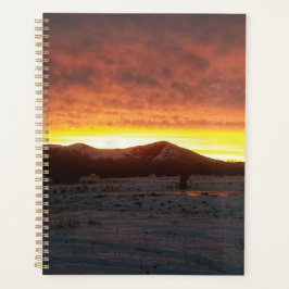 Sonnenuntergangs-Schneeplaner Planer