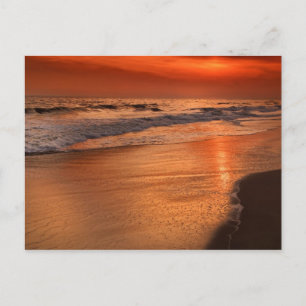 Sonnenuntergangsreflexionen auf Wolken und Ozeanst Postkarte