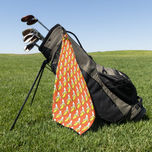 Sonnige Bananen in Orange Golfhandtuch (Gras)