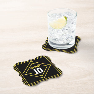Sous-verre en papier noir et jaune inspiré des spo