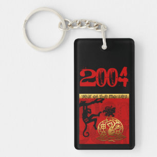Soutenu dans le porte - clé 2004 de monogramme de