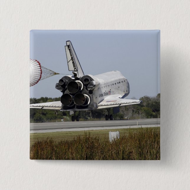 Space Shuttle Atlantis entfaltet seinen Drag-Rute  Button (Vorderseite)