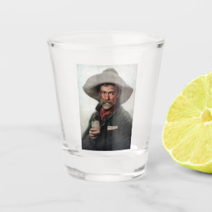 Spanischer Rancherocowboy in einem Saloon des alte Schnapsglas