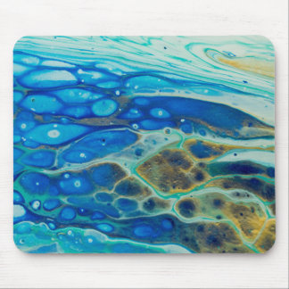 Sparfkling arrose le tapis de souris