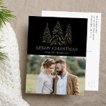 Sparkling Winter Pine Black Merry Christmas Photo Feiertagspostkarte<br><div class="desc">Modern & elegant holiday postcard featuring your photo complimented by a snowy faux gold foil pine tree with a black background (or color of your choice). "Merry Christmas" is displayed in a white, modern serif font with your name or custom text below. The photo holiday postcard reverses to display your...</div>