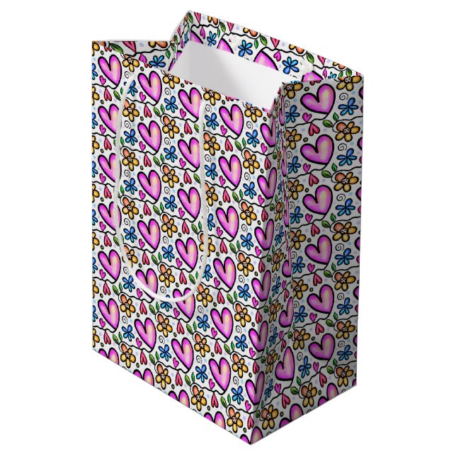 Spaß Rosa Herzen und orange blaue Blumen Mittlere Geschenktüte (Rückseite Schrägansicht)