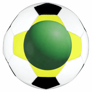 Sphère verte sur ballon de football jaune
