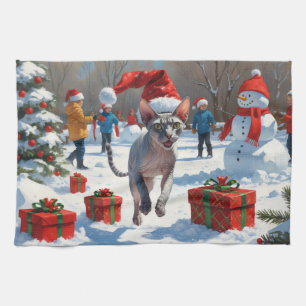 Sphynx Cat läuft im Schnee mit Weihnachtsmütze Geschirrtuch