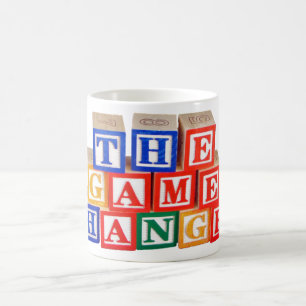 Spiel-Wechsler-Gebäude-Blockschrift Kaffeetasse