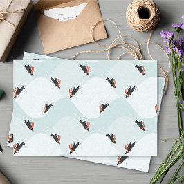 Spielerische Pinguine, die auf dem Schneepattern g Seidenpapier