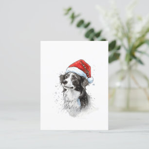 Spielerischer Hund in Weihnachtsmannmütze mit Schn Postkarte