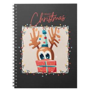 Spielerischer Rentier mit Geschenk Notizblock
