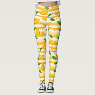 Spielerisches Orange Slice Muster mit grünen Blätt Leggings