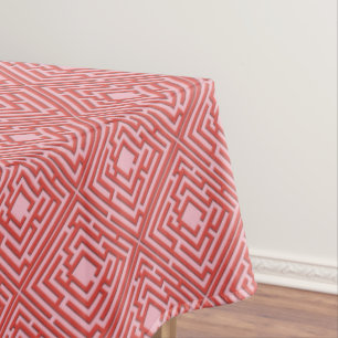 Spielerisches rotes Labyrinth auf irgendeiner Tischdecke