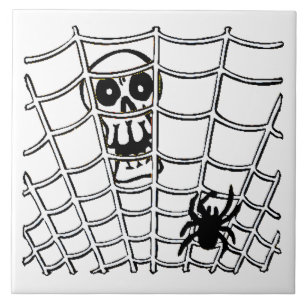 Spinne im Netz mit Totenkopf Halloween Kachel