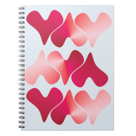 Spiral-Notizbuch mit Herzen und blauem Hintergrund Notizblock
