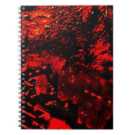 Spiral-Notizbuch rotes Texturell im Dunkeln  Notizblock