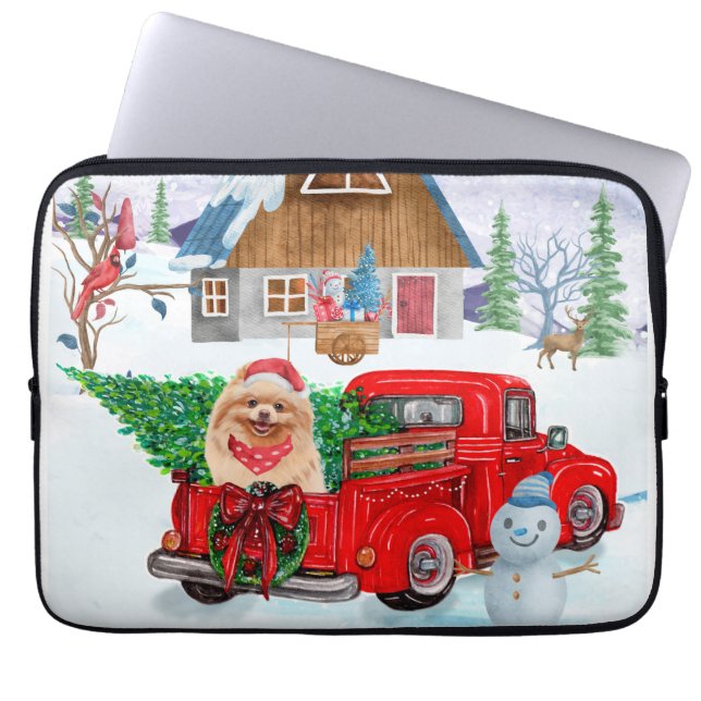 Spitz Hund in der Weihnachtslieferung LKW Schnee Laptopschutzhülle (Vorderseite)