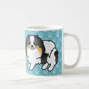 Spitz-Hunde mit weißer Trikolade auf blau Kaffeetasse