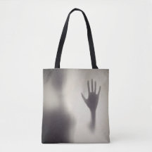 Spitzige Hand auf der Glasplatte Halloween Totbeut